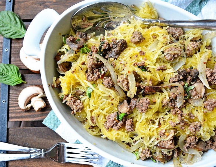 With fresh herbs, hearty mushrooms and grass-fed beef, this spaghetti squash recipe makes for a stunning meal that's easy to make!