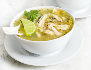 Serve up a bowl of warm chili verde soup with fresh veggies and shredded chicken. It has the perfect amount of zip and heat!