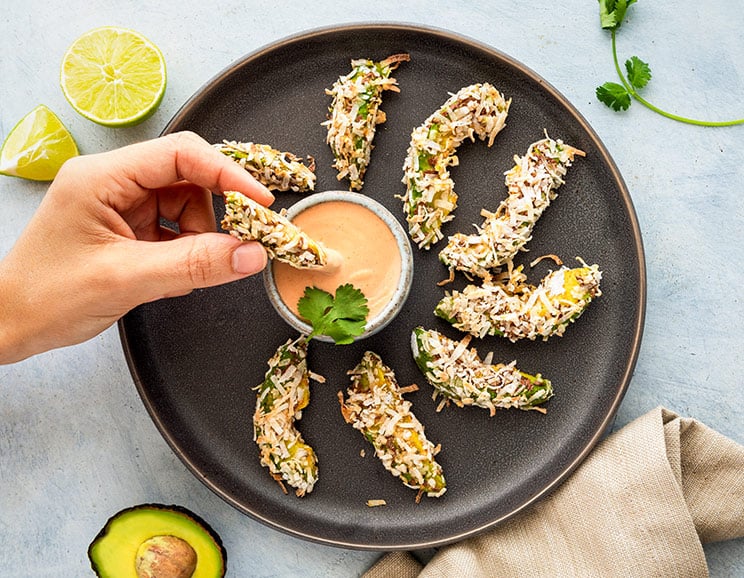 Want a creamy but crunchy side dish? These Coconut-Crusted Avocado Fries are light, healthy, gluten-free, dairy-free, egg-free and totally scrumptious.