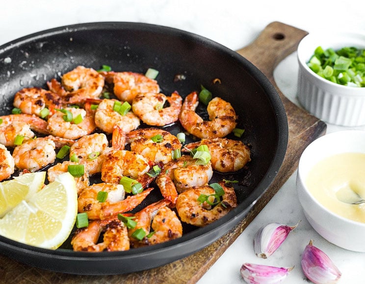 Sizzle garlic shrimp in buttery Hawaiian-inspired sauce for a flavorful, one-pan meal. Just coat them in a zesty marinade and toss onto the skillet!