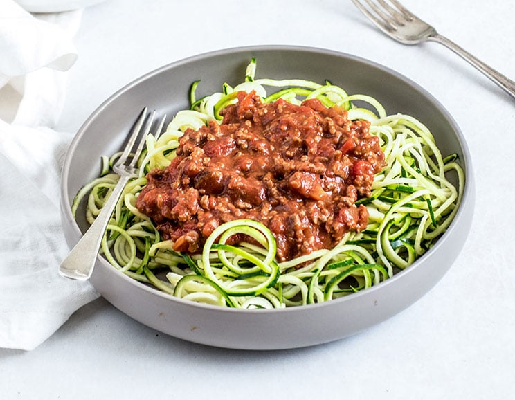 This amazing Paleo zucchini noodles recipe makes for an delicious and healthy lunch or dinner. Made with fresh zoodles and a hearty meat sauce.
