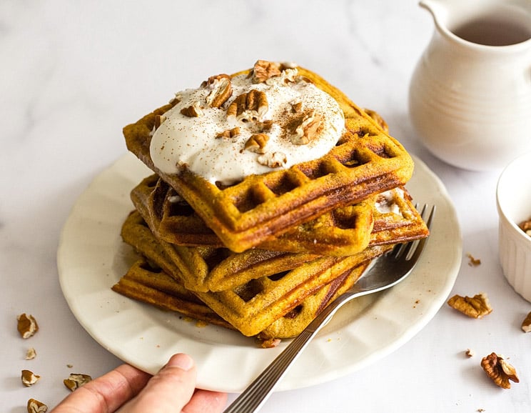 Make these fluffy pumpkin protein waffles with two healthy scoops of collagen. Top it with coconut whipped cream for a decadent breakfast!