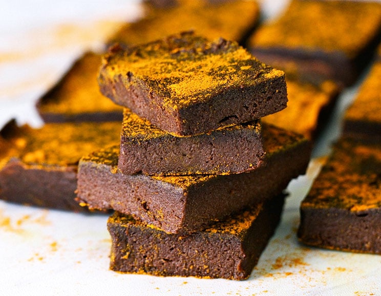 Mixed with a little cacao powder, protein powder, dates and cashews, these avocado, no-bake treats are the dreamiest fudge bars you’ve ever had.