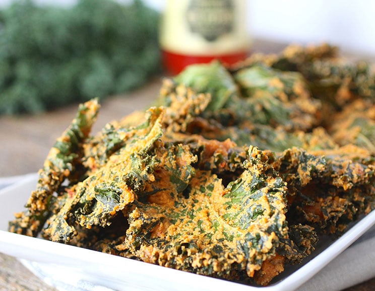 Are you ready for this? That’s right, nacho cheese! Today we’re sharing a can’t-miss paleo Nacho 'Cheese' Kale Chips Recipe….but without the cheese!
