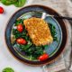 This crunchy baked cod with a hemp seed coconut crust is a protein-packed, deliciously spicy meal with just a handful of healthy ingredients.
