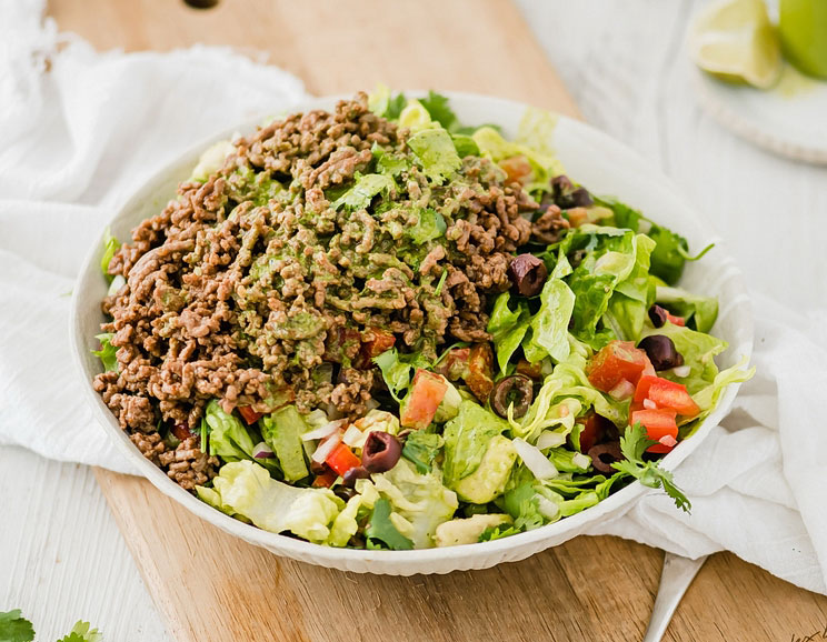 Make taco night a weekly tradition in your home! This paleo taco salad makes for a perfect lunch or dinner and will keep you satisfied throughout the day.