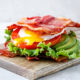 Transform crispy strips of bacon into woven sandwich slices for a decadent meal that’s low in carbs and high in protein!